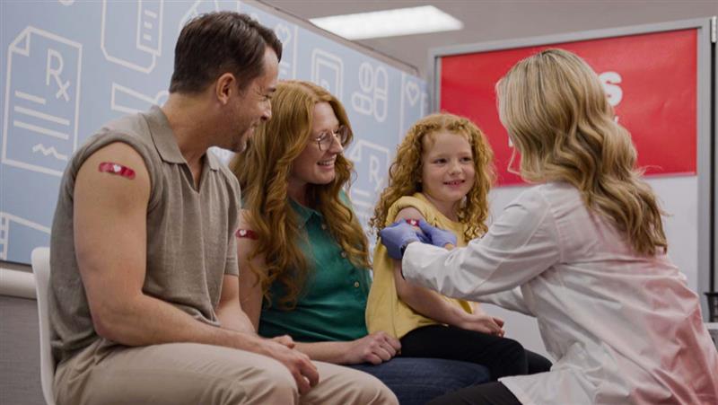 A family gets their vaccinations together at the same with the same provider.